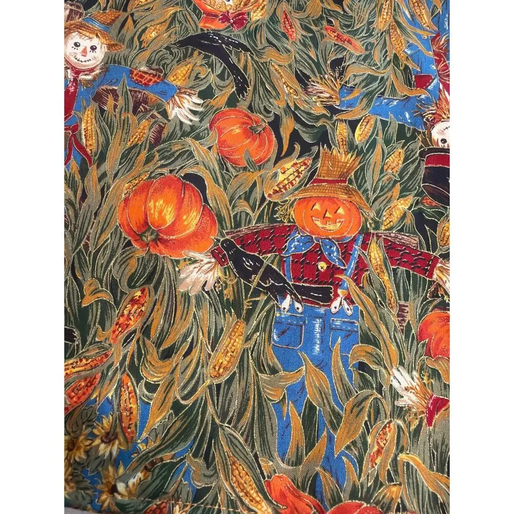 4 fall placemats with scarecrows, pumpkins, crows and cornstalks